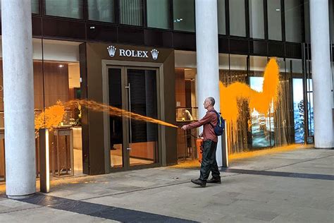 rolex protest|Just Stop Oil activists spray orange paint on Rolex store in .